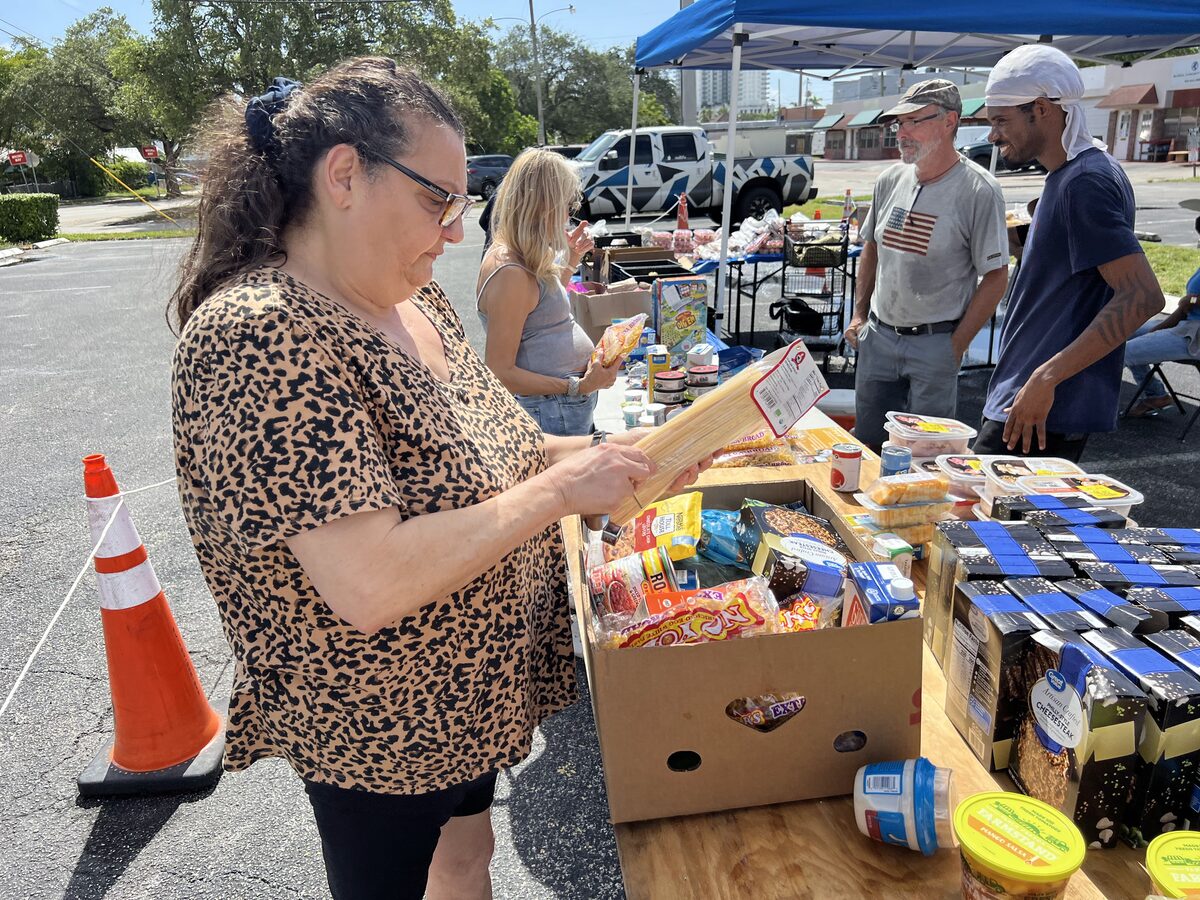 Volunteers handing out food in the community